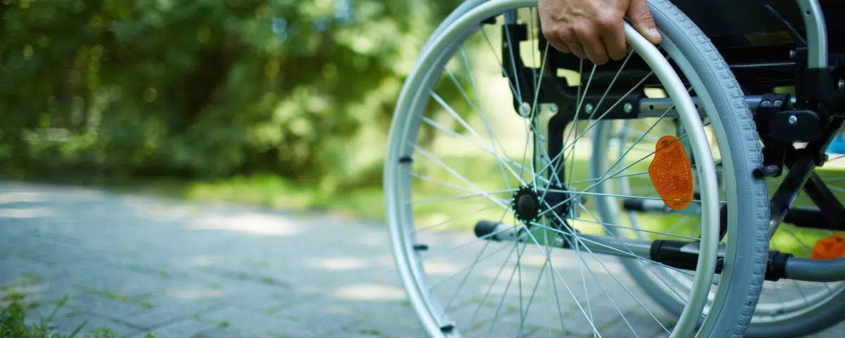 A man using his wheelchair to get around