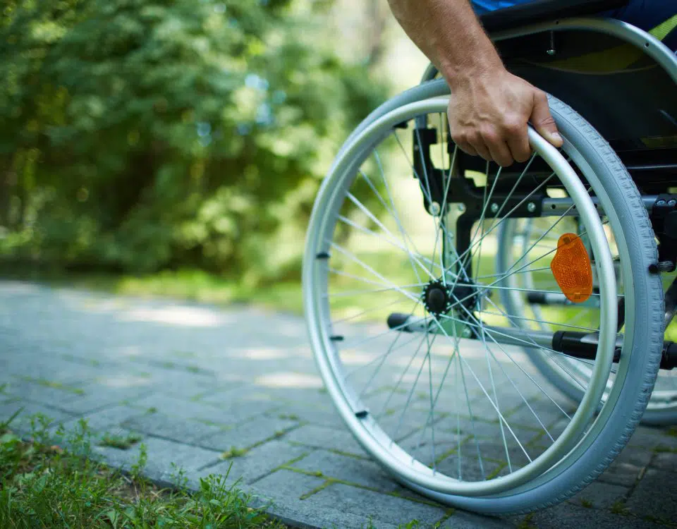 A man using his wheelchair to get around